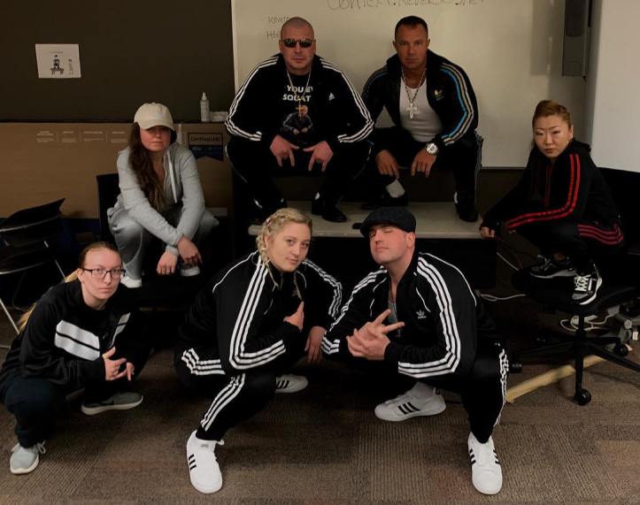 squatting slav group on table male female